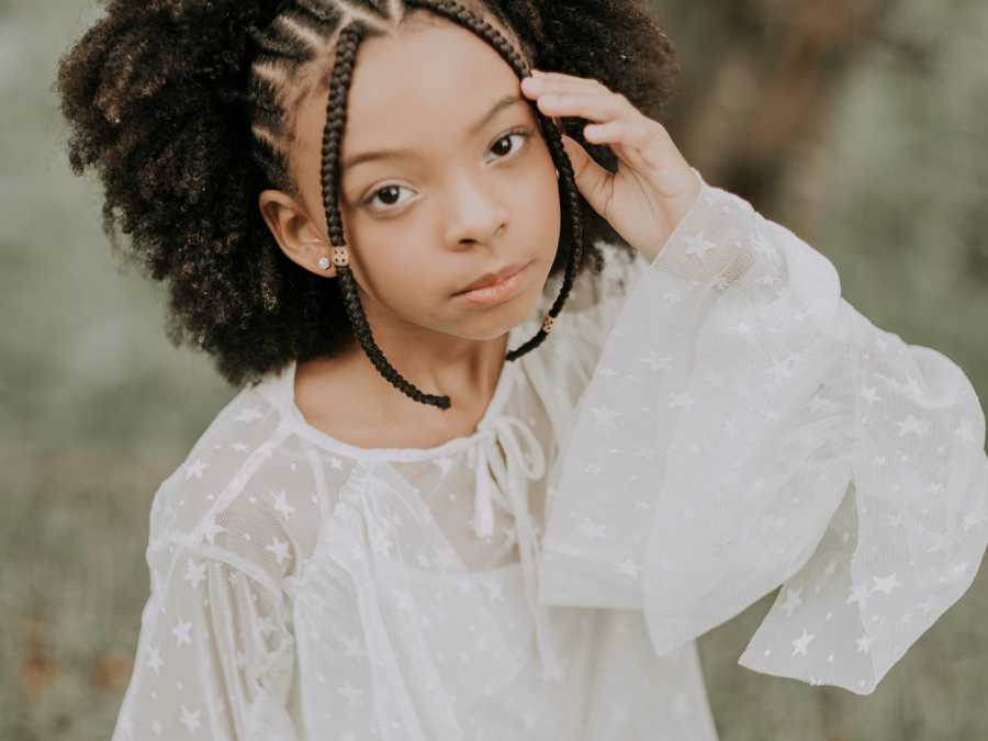 child-hairstyle-too-tight-child-keeps-touching-their-hair