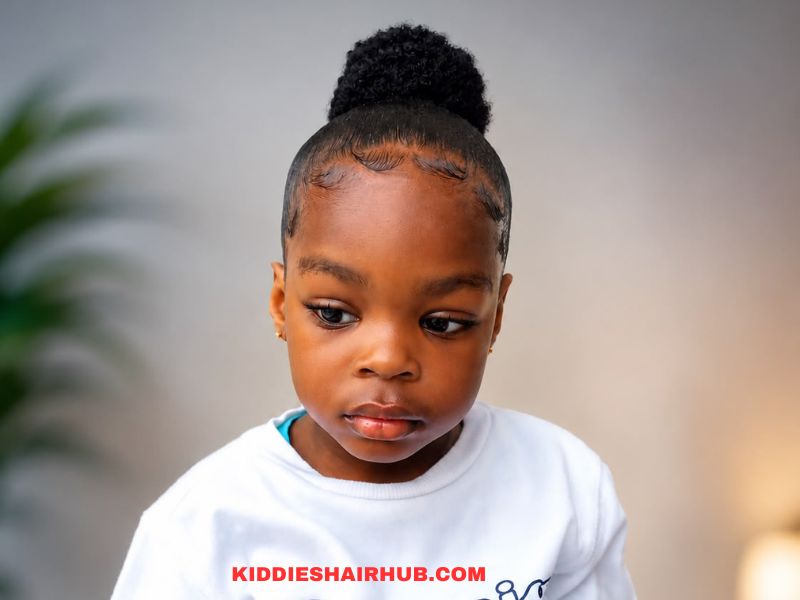 a-young-lack-girl's-natural-hair-while-protecting-the-hair-around-her-hairline.